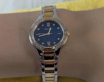 Vintage Bulova Ladies Diamond Watch - Handset diamond Bezel Blue Dial Model 98R223