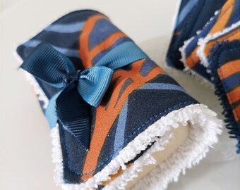 Handmade soap wrapped in its washable wipe in blue and ocher tones