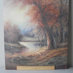 May include: A painting of a forest scene with a lake in the background. The trees are in shades of brown and red, and the lake is a deep blue. The sun is shining through the trees, creating a warm glow.