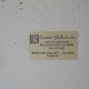 May include: A white business card with black text. The text reads "Creative Galleries, Inc."  "4805 W-MILHAM" "KALAMAZOO, MI 49002" "616-375-6613" "Bored with your job? ... try ours!" "142676"