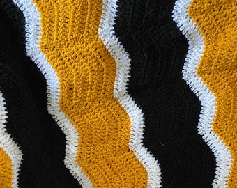 Pittsburgh Steelers/ Penguins/Pirates themed chevron style black and gold Pittsburgh afghan.