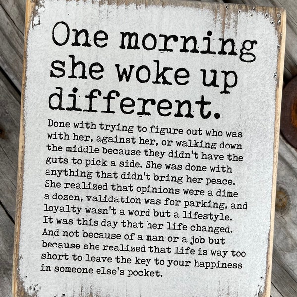 One morning she woke up different|Freestanding block sign