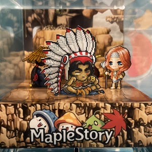May include: A 3D diorama of a MapleStory character wearing a Native American headdress. The character is sitting on a rock with a brown background. The diorama is in a clear acrylic box with a brown base. The base has the text "MapleStory" printed on it.