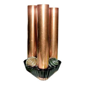 May include: A decorative centerpiece featuring three tall, cylindrical copper-toned pillars arranged vertically. The base is a dark, fluted, triangular holder that includes two small, spherical accents with a wire-wrapped design on the front.