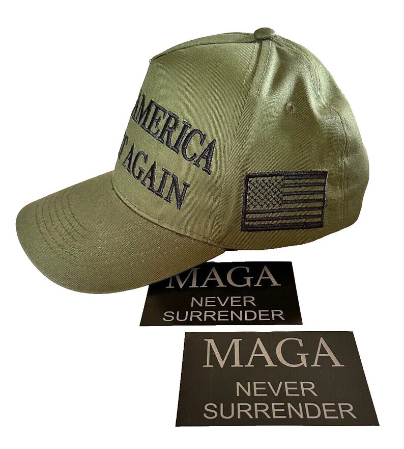 May include: A green baseball cap with the text "Make America Great Again" embroidered on the front. The cap also features a small American flag patch on the right side. Two stickers are included, both with the text "Maga Never Surrender".