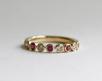 14k gouden diamant en robijn jubileumband maat 6,5