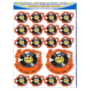 May include: Sheet of stickers featuring cartoon vinyl records with smiling faces and the text "80s O Rock." The stickers are black, orange, and white, with musical notes and the phrase "Let the Good Times Roll!"