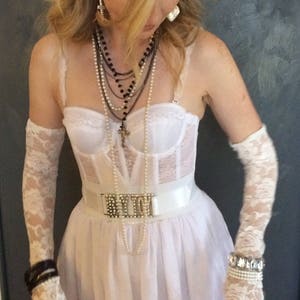 Madonna costume with accessories. Plus sizes available as well.