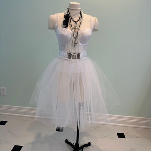 Deluxe Madonna costume with upgraded accessories. Plus sizes available as well.