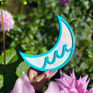 Iridescent Blue and White Crescent Three Wave Moon