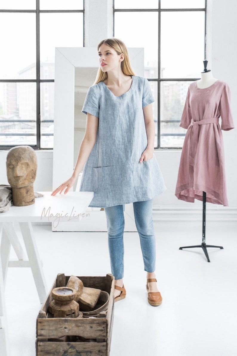 This chambray blue linen artist style tunic with front pockets is perfect for running errands!