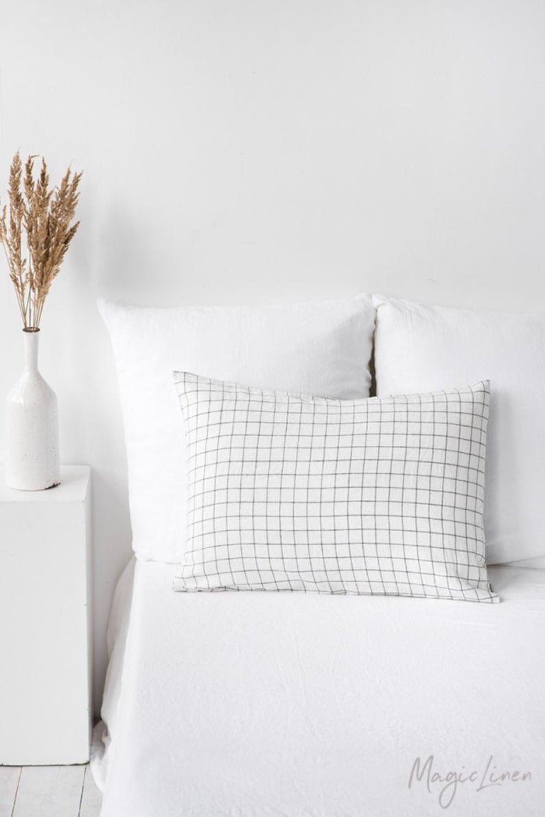 MagicLinen charcoal grid linen pillowcase and white bedding - a serene bedroom awaits!