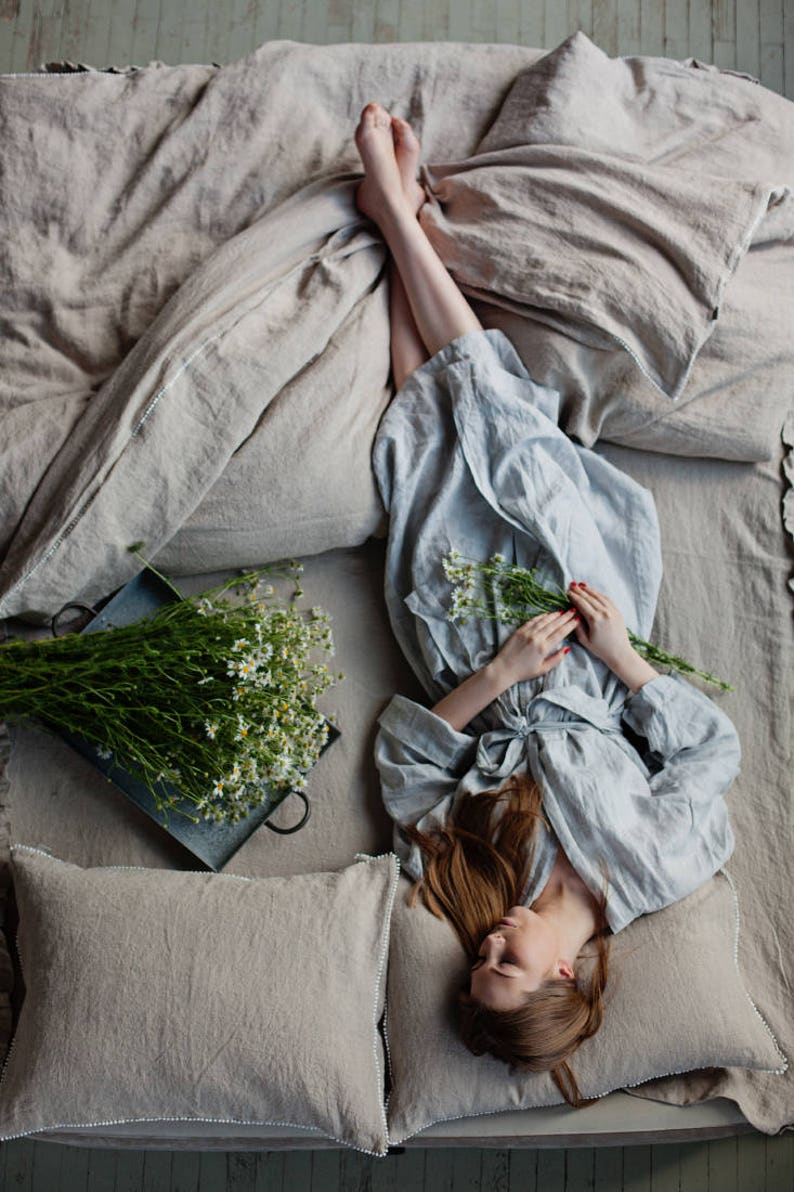 Tranquil linen bedding and model in linen robe - Magic Linen on etsy.