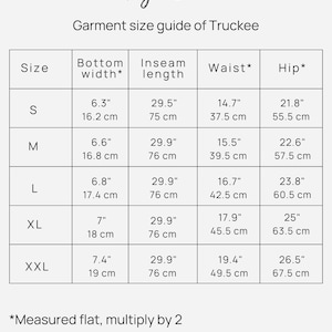 May include: Size chart for women's trousers with measurements in inches and centimetres. The chart shows the bottom width, inseam length, waist, and hip measurements for sizes S, M, L, XL, and XXL.