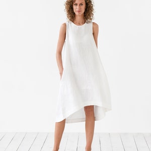 Clay linen dress Royal Toscana. Asymmetrical, sleeveless, loose, knee-length linen summer dress. Women's clothing. White