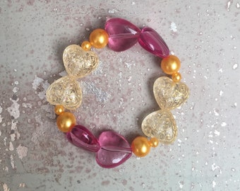Pulsera para niños con remolinos de oro