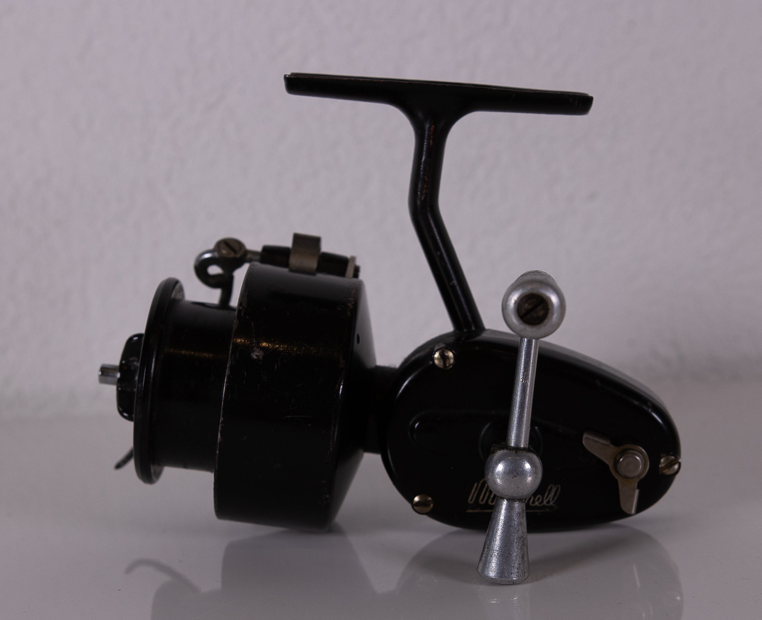 Old fishing spinning reel – Mitchell 300 version 3 .