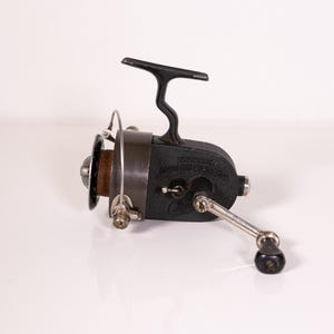Old fishing spinning reel – DAM Quick Standard