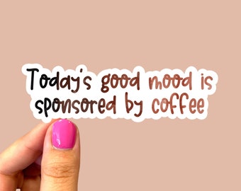 May include: White sticker with black text that reads "Today's good mood is sponsored by coffee".