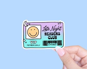 May include: A purple and blue sticker with a smiling face, the text "Late Night Readers Club", and the words "VIP Members Only" and "67938601".