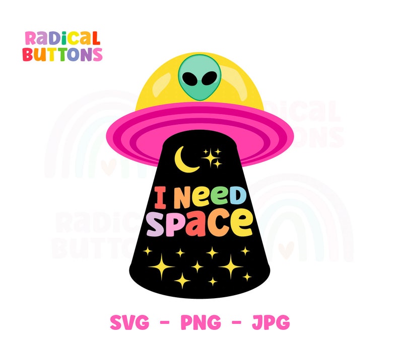 May include: A colorful graphic design of a flying saucer with a green alien inside. The saucer is pink and yellow with a black base that says "I Need Space" in rainbow colors. There are stars and a crescent moon on the black base.