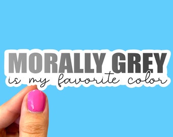 May include: A sticker with the text "MORALLY GREY is my favorite color" in a gray gradient font on a white background.