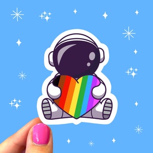 Autocollant de cœur de fierté d’astronaute / Autocollants de drapeau de la fierté / Autocollant de fierté inclusive / Autocollants de justice sociale / Autocollant LGBTQIA