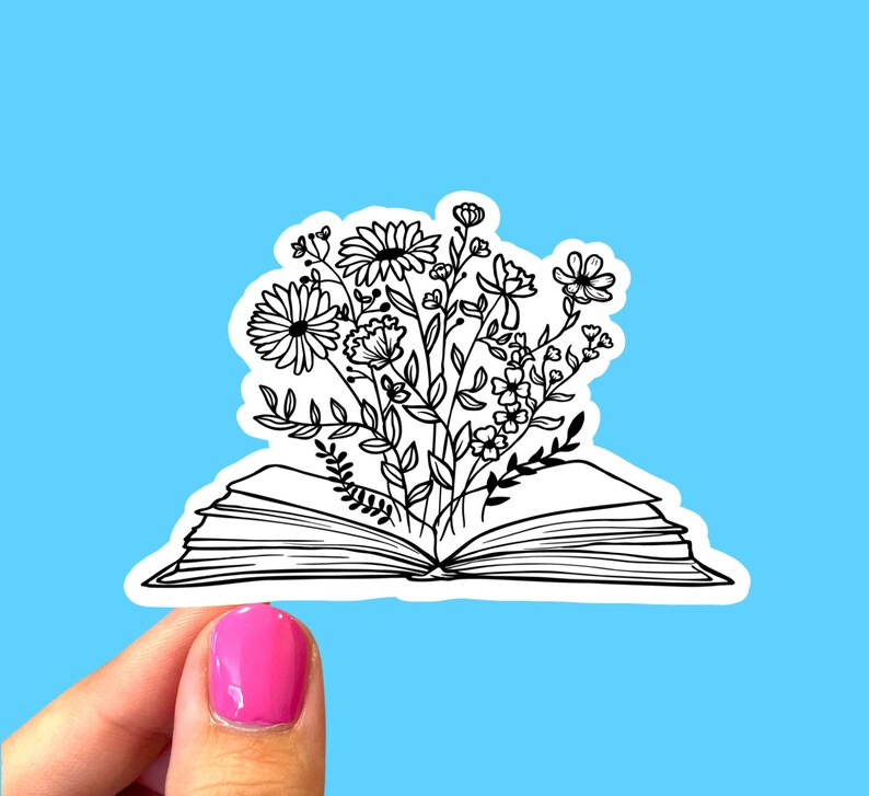 Puede incluir: Un dibujo en blanco y negro de un libro abierto con un ramo de flores que crece de &eacute;l. Las flores est&aacute;n estilizadas y tienen formas simples.