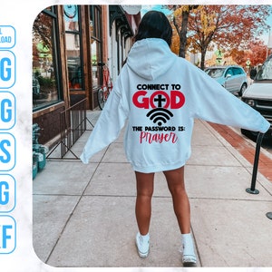 Puede incluir: Sudadera blanca con el texto "Connect to God" en rojo y un s&iacute;mbolo de wifi con el texto "The Password is: Prayer" en rojo.