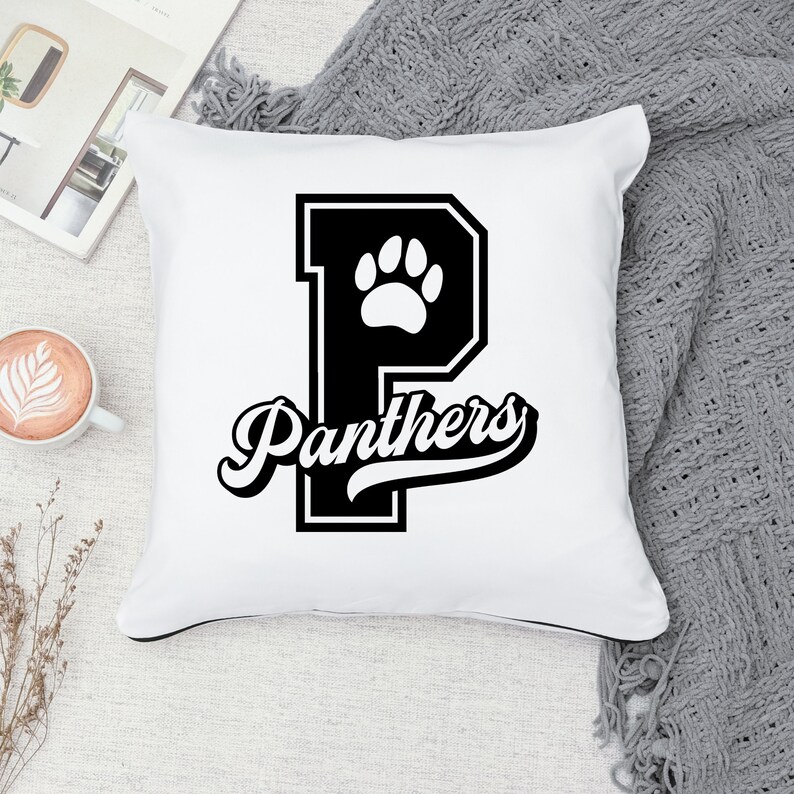 May include: White throw pillow with a black and white graphic of a letter P with a paw print inside and the word "Panthers" in a black script font.