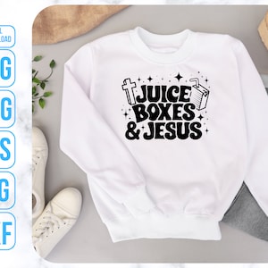 May include: White sweatshirt with black text that reads "Juice Boxes & Jesus" with a cross and a juice box graphic.