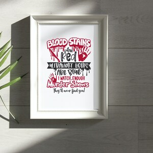 May include: White framed print with red text that reads "Blood Stains Are Red Ultraviolet Lights Take Blue I Watch Enough Murder Shows They'll Never Find You!"