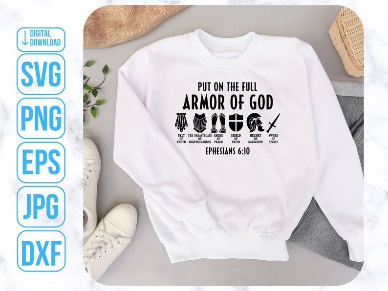 Puede incluir: Sudadera blanca con texto negro que dice "Ponte la armadura completa de Dios" con un gr&aacute;fico de la armadura de Dios y la escritura Efesios 6:10.