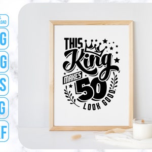 May include: Black and white graphic design with the text "This King Makes 50 Look Good" with a crown and stars.