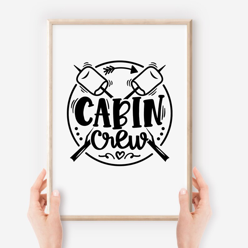 May include: Black and white illustration of two crossed sticks with marshmallows on the ends, a circle around them with the text "CABIN CREW" inside.