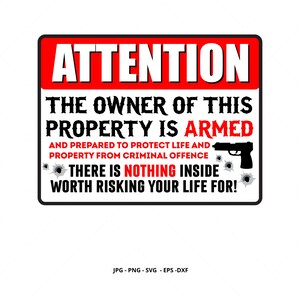 May include: Red and white sign with the text "ATTENTION" in large red letters. The sign reads "The owner of this property is armed and prepared to protect life and property from criminal offence. There is nothing inside worth risking your life for!"