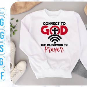 Puede incluir: Sudadera blanca con texto negro que dice "Connect to God" con un c&iacute;rculo rojo alrededor de la palabra "God" y una cruz dentro del c&iacute;rculo. Debajo del c&iacute;rculo hay un s&iacute;mbolo de wifi y el texto "The password is: Prayer" en negro.