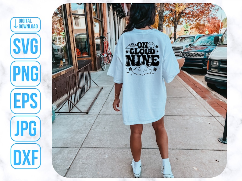 May include: White t-shirt with black text that reads "On Cloud Nine" with a cloud and stars graphic.