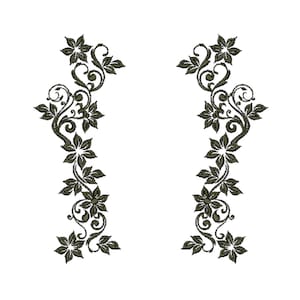 May include: A pair of symmetrical black floral designs with intricate swirls and leaves. The designs are separated by a white space.