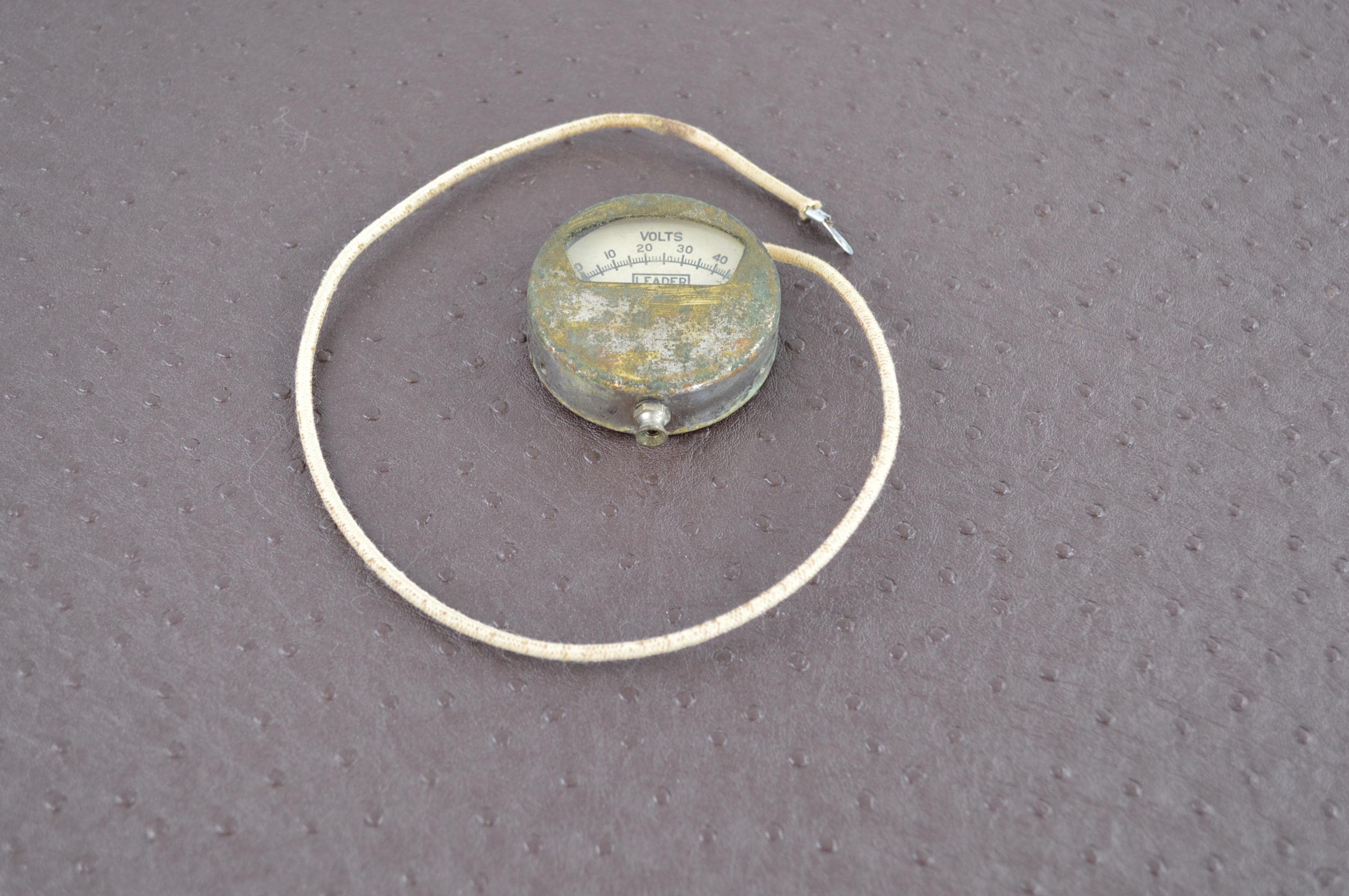 Vintage Battery Tester in Case Plus an Old Gas Can