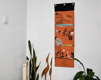 Wall utensil for magazines - Mrs Knallerbse - The orange wall organizer with birds and branches creates storage space in the office