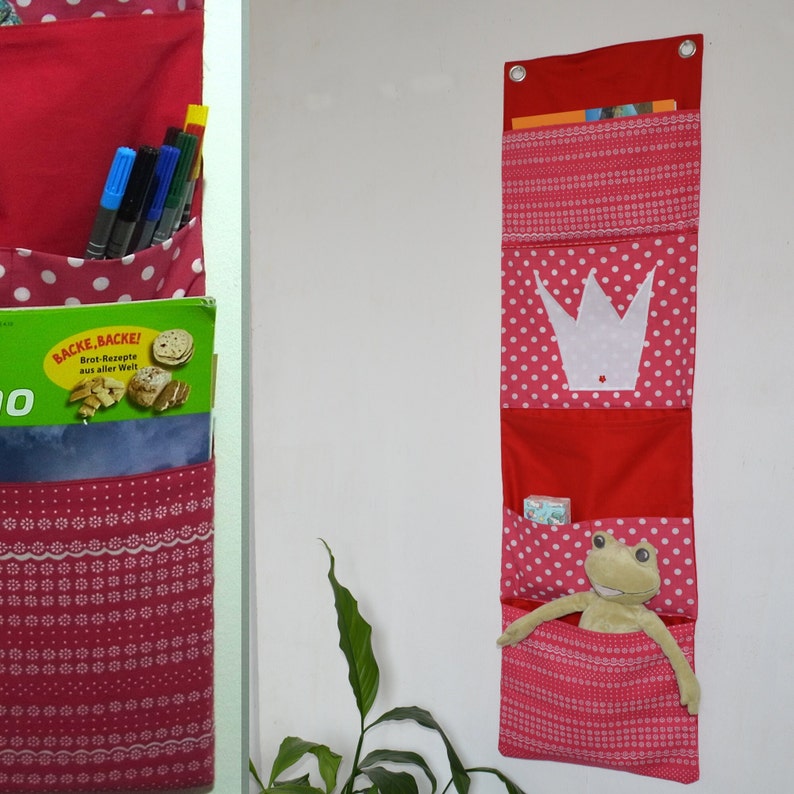 Wandutensilo mit Krone Prinzessin Knallerbse Der Wandorganizer für Prinzessinen in rot weiß schafft Ordnung Mädchenzimmer Bild 1