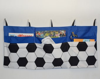 Wall utensil - 6 pockets - football fan cracker pea - great storage in the boy's room. Creates order in the smallest of spaces.