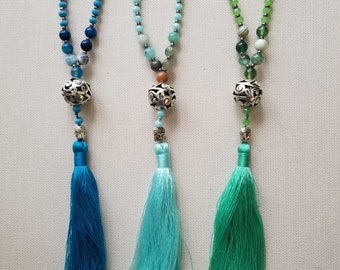 Long beaded tassel necklace with Buddha head charm 42" fashion jewelry Glass Beads green, blue or light blue