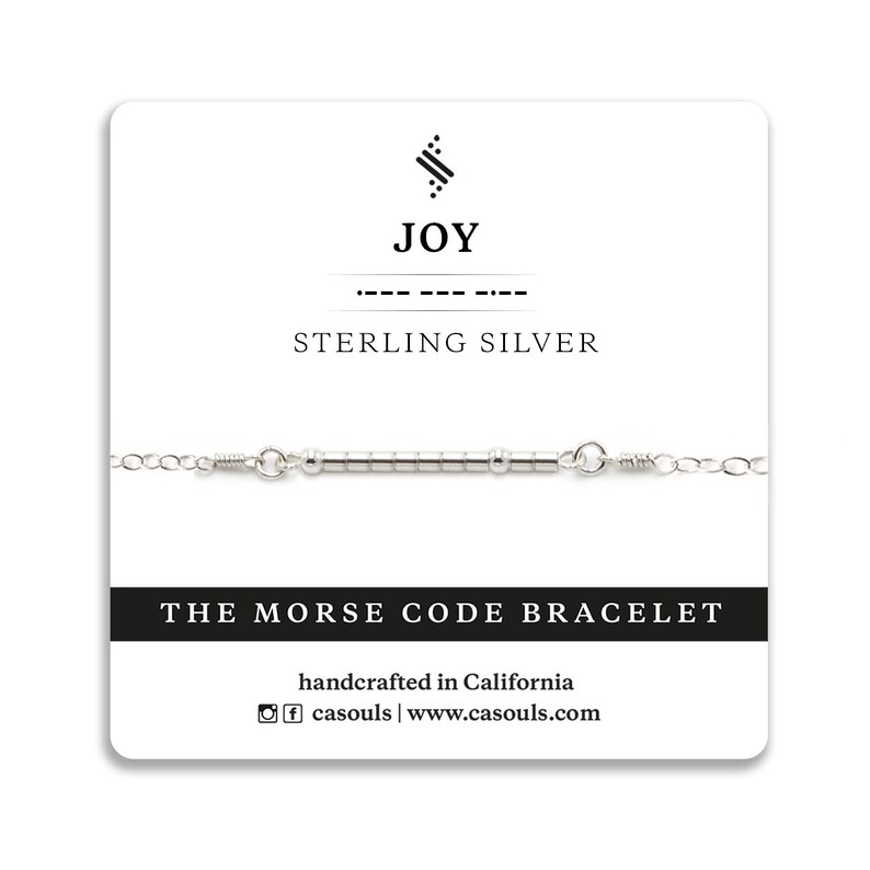 May include: Sterling silver bracelet with a bar of beads that spell out the word "JOY" in Morse code. The bracelet is handcrafted in California and is available on the website casouls.com.