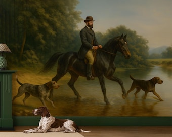 May include: A wall mural depicting a person in a brown hat and dark coat riding a black horse through a river, accompanied by two dogs. In the foreground, a brown and white spotted dog lies on a beige rug near a green fireplace mantle.