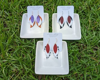 Pendientes de color del equipo GameDay