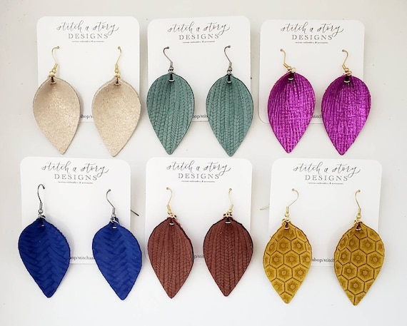 Pinched faux cheap leather earrings
