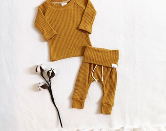 mustard baby grow