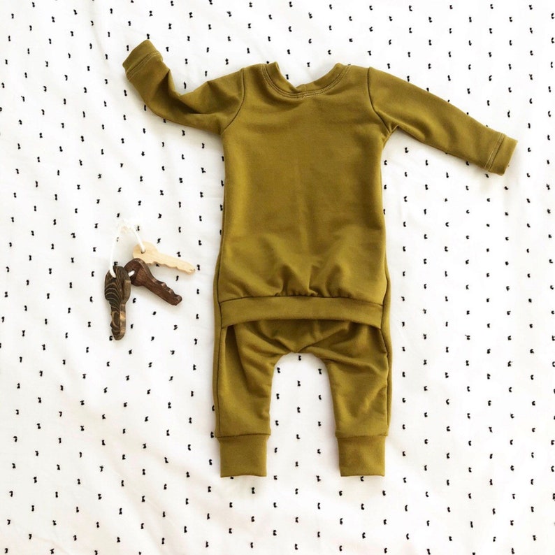 green baby outfit